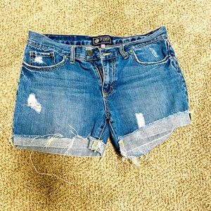 Victoria’s Secret Blue jeans cut offs.